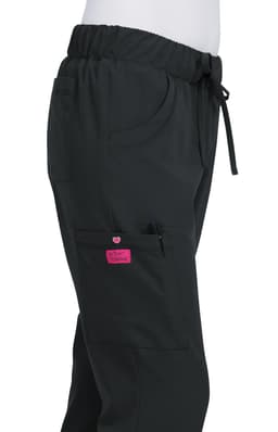 A pair of black pants with an elastic waistband and pockets, featuring a pink logo.