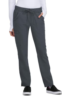 Grey pants with a drawstring waist, featuring side pockets and a logo on the side. Worn by a model against a white background.