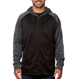 A man is wearing a black full zip performance raglan hoodie with grey sleeves and a front pocket. The hoodie has a logo.