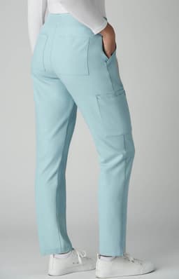 Light blue Atria Pant displayed from the back, featuring two rear pockets and a slim fit silhouette.