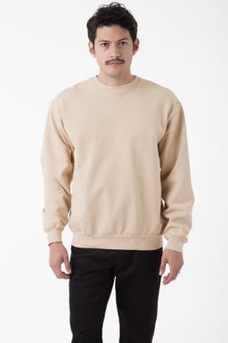 A beige heavy fleece pullover featuring a crew neckline and long sleeves, modelled by a man.