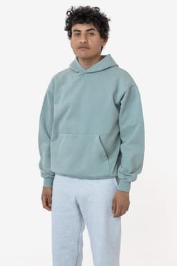 A light green hooded pullover made from heavy fleece, featuring a kangaroo pocket and ribbed cuffs.