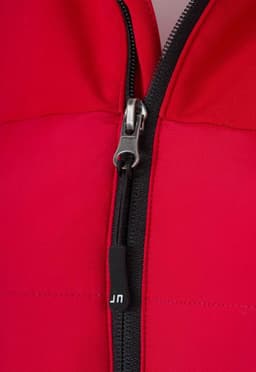 A red soft shell jacket featuring a front zip and a branding logo.