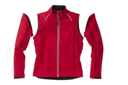 A red ladies zip-off softshell jacket with detachable sleeves and a branded logo.
