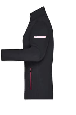 A black ladies' softshell jacket with pink zippers and a fitted design, featuring a logo on the sleeve.
