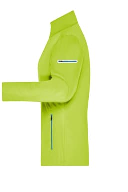 A ladies' softshell jacket in bright lime green colour with a zip pocket and contrasting blue details.
