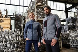 A polar fleece jacket in grey, featuring a zipped front and contrasting details, worn by a man and a woman.