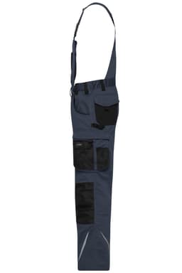 Workwear pants with bib in navy blue featuring black pockets and reflective detailing. Includes adjustable straps and a logo.