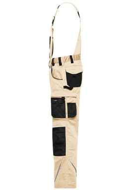 Workwear pants with bib in light beige, featuring multiple pockets and black trims. Includes adjustable straps and branding.