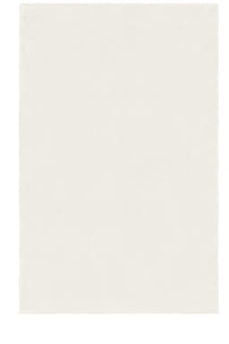 A soft, cream-coloured microfibre fleece blanket with a subtle, smooth texture and no visible patterns.