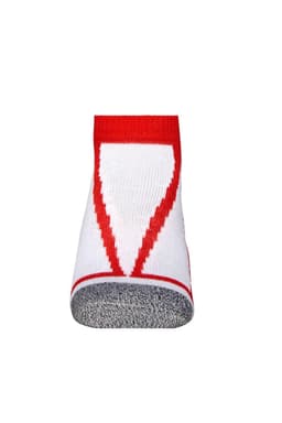 A pair of white sneaker socks featuring red accents and a textured grey sole. The design includes a bold pattern.