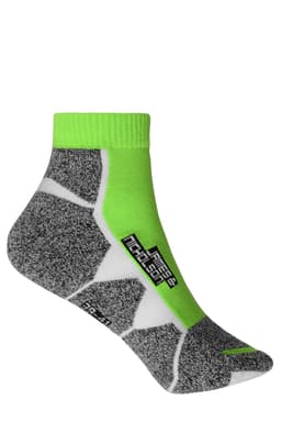 A pair of sporty ankle socks in grey and bright green, featuring a logo and a unique design.