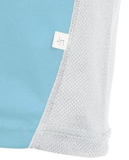A close-up of a light blue sports shirt with mesh detailing, featuring a small logo.