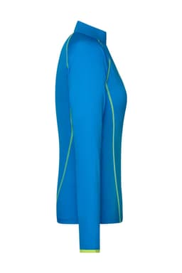 A blue long-sleeved ladies sports shirt with green accents and a collar. It features a logo on the garment.