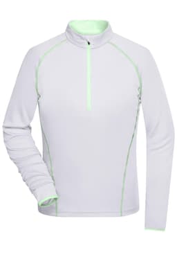 A light grey ladies' sports shirt with a zip neck and green accent stitching. It features long sleeves and a logo.