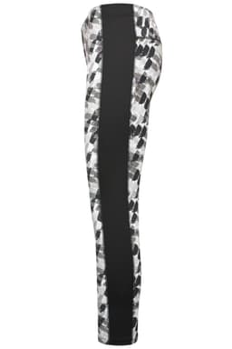 Ladies sports tights featuring a patterned design with black side panels. Includes a logo on the waistband.