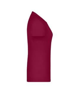 A red women's t-shirt with a fitted design and short sleeves, featuring a logo on the front.