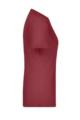 A red Ladies Basic-T shirt displayed from the side, featuring a simple design and a logo.