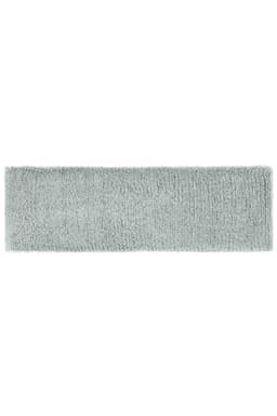 A soft, terry cloth headband in a light grey colour with a textured surface and a logo.