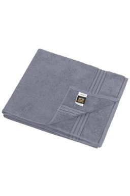 A grey sauna sheet folded neatly, featuring a tag and a textured surface. It has a subtle striped design.