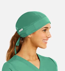 A unisex scrub cap in vibrant green, featuring a logo and designed for comfort and fit.