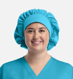 A unisex bouffant scrub cap in bright turquoise, featuring an elasticated band for a secure fit.