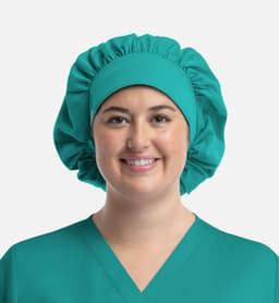A unisex bouffant scrub cap in vibrant teal, featuring a gathered design for a comfortable fit.