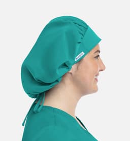 A unisex bouffant cap in teal, featuring a fitted design and a logo on the side.