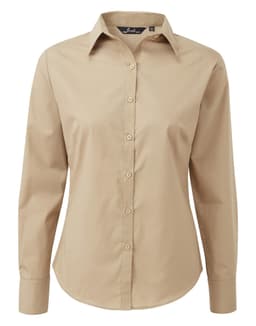 A women's long-sleeve button-up blouse in a light beige colour, featuring a classic collar and logo.