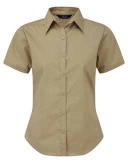 A women's short-sleeve poplin blouse in khaki with a button-up front and a collar. It features a logo.