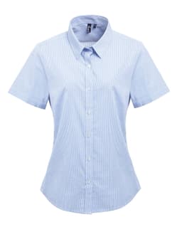 A short-sleeved button-up shirt in light blue with a microcheck pattern, featuring a collared neckline and buttons.