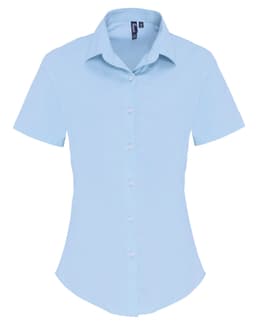 A light blue women's stretch fit cotton poplin short-sleeve blouse with a button-up front and a collar.
