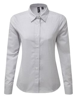 A women's long-sleeve button-up shirt in a grey check pattern with a collar and a logo.