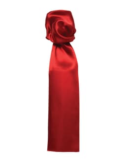 A plain red scarf with a smooth satin finish, featuring a knotted design at one end.