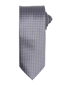 A grey tie featuring a textured pattern, rolled and displayed against a plain background. It includes a logo.