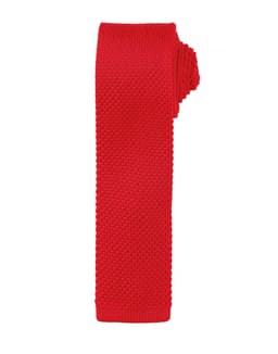 A slim knitted tie in vibrant red, showcasing a textured pattern. The tie is neatly rolled and has a branding logo.