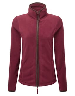 A women's polar fleece jacket in a rich burgundy colour with a zip front and high collar. The jacket features a logo.