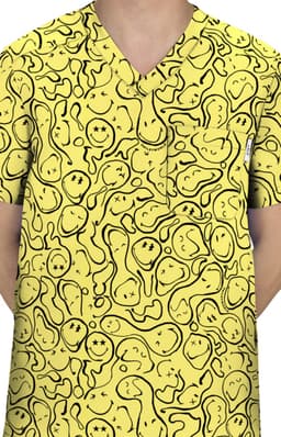 A yellow scrub top featuring a playful, abstract pattern with various shapes and lines, accentuated with black outlines.