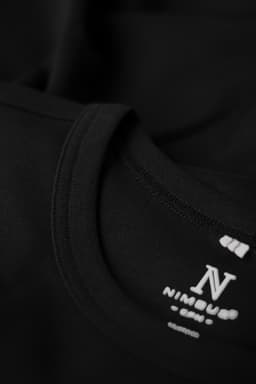 A black men’s t-shirt featuring a round neckline and a logo on the label.