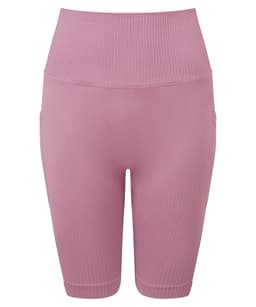 Ribbed seamless cycle shorts in a soft mauve colour, featuring a high waistband and a form-fitting design.