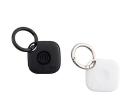 A black and white Tile Mate with key ring attached, featuring a simple design and a logo.