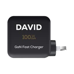 A black GaN quick charger with a plug and a branding logo, featuring a compact design for travel use.