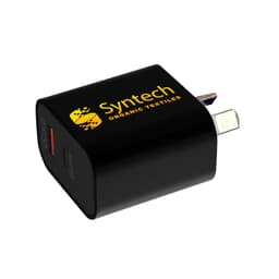A black wall charger with a USB port, featuring a logo on one side and a prong for plugging in.