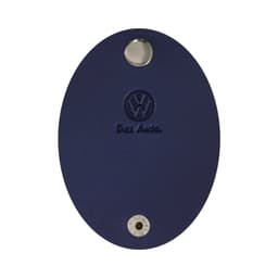 A navy oval cable wrap with a metal attachment hole and a logo. Features a smooth surface.
