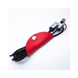 A red cord wrap neatly holds two black charging cables, featuring a snap button and an embossed logo.