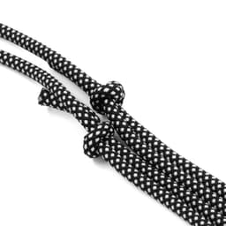 A pair of black and white patterned ropes with knots, featuring a textured design.