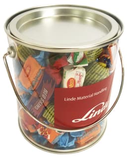 A clear PVC bucket filled with colourful Allen's lollies, featuring a metal handle and a red branding label.