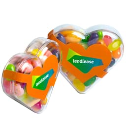 Acrylic heart-shaped container filled with colourful JELLY BELLY jelly beans, featuring a logo.