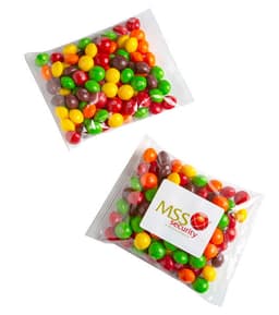 A bag of Skittles, featuring a mix of red, green, yellow, orange, and purple candies, with a logo on the packaging.