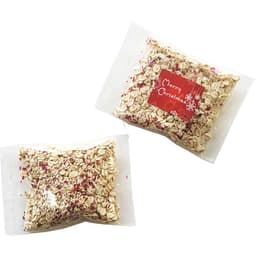 A clear bag of Reindeer Food containing oats and colourful sprinkles, with a festive label and a logo.